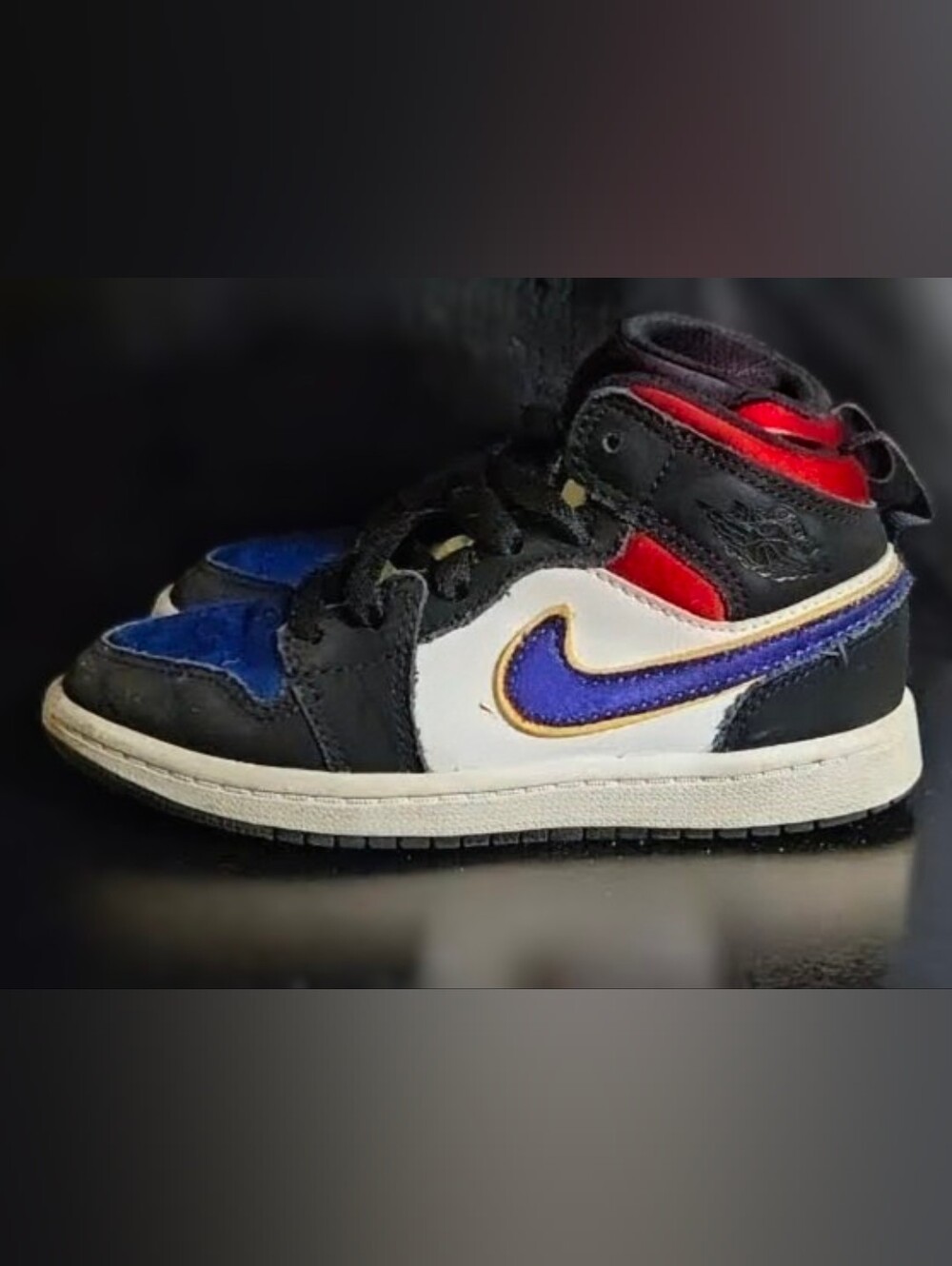 Nike Air Jordan 1 Kids High-Top Sneakers in Black, White, Blue, Red, and Purple